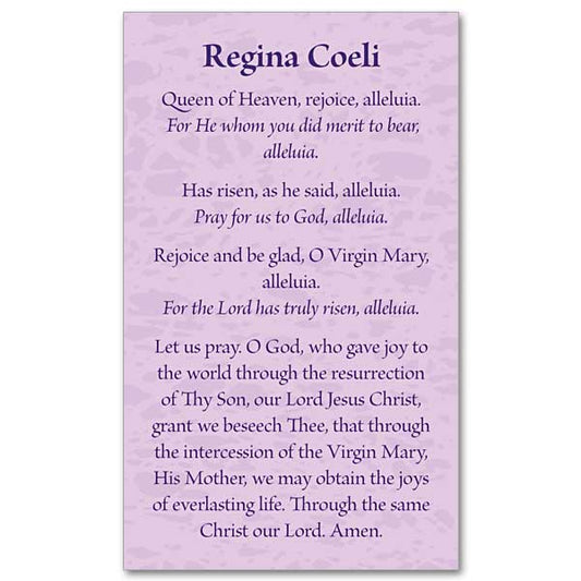 Regina Coeli prayer in black lettering on a mottled violet colored background.