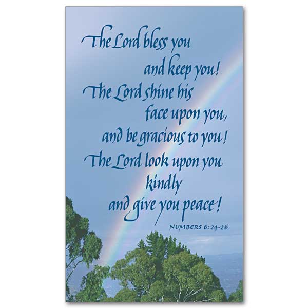 Text from Numbers 6:24-26 in calligraphy in blue on a background photo of a rainbow in the sky as seen above a grove of trees.