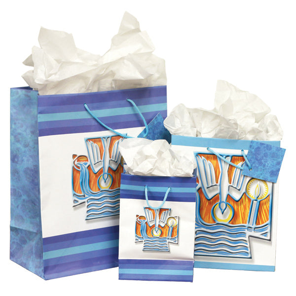 Celebrate the sacrament of Baptism with these beautiful bags. All three bags feature an illustration on the front and back depicting a dove, a baptismal candle, and water being poured into a pool, all inside the shape of a cross. Various patterns color the sides of the bags in shades of blue. Gift tags attached. <br> Bag sizes are 5 1/4&quot; x 7 5/8&quot;, 7 5/8&quot; x 9 1/2&quot;, and 10 1/2 x 12 3/4&quot;. <br> Image is for demonstration purposes only. Tissue paper is not in