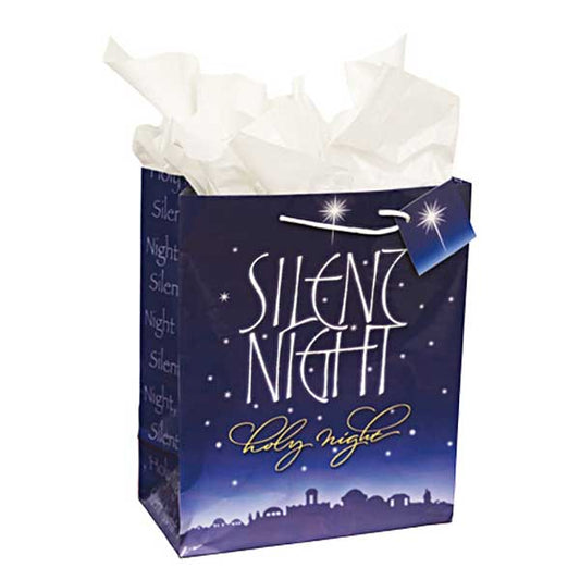 This beautiful blue gift bag features the opening lines of the Christmas carol <em>Silent Night</em>, with a silhouette of Bethlehem along the bottom. The side panels contain the phrase &quot;Silent Night, Holy Night&quot; repeated. Gift tag attached.