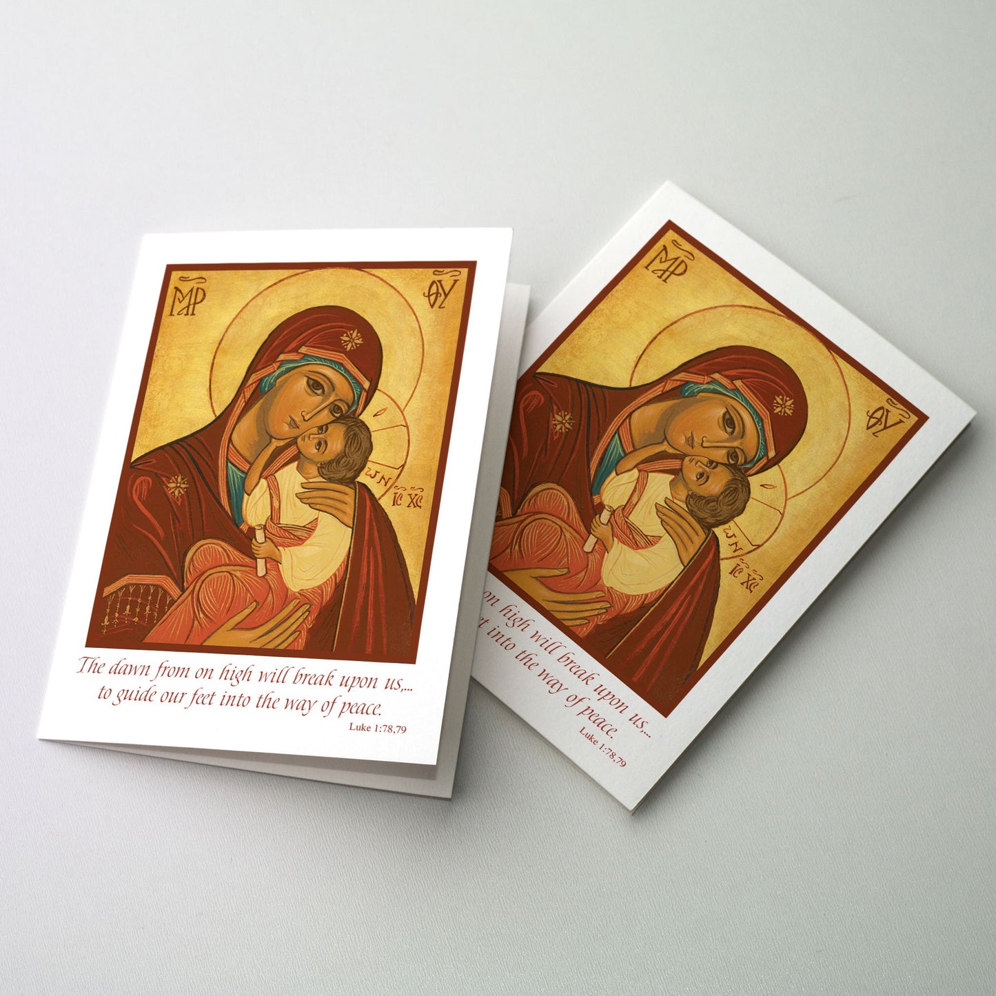 Icon of Madonna and Child with text below.