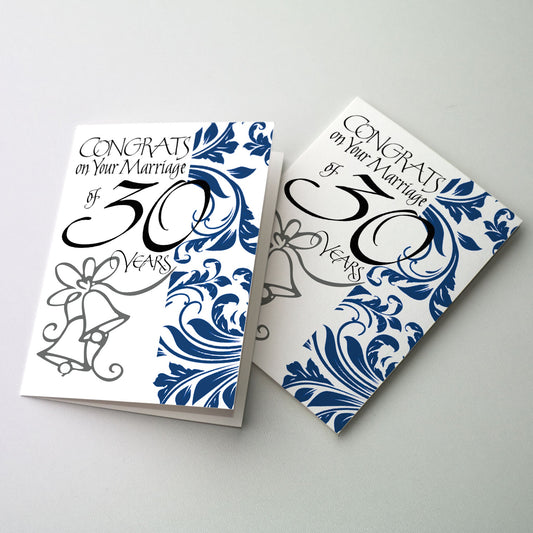 Blue floral pattern with calligraphy and bells.