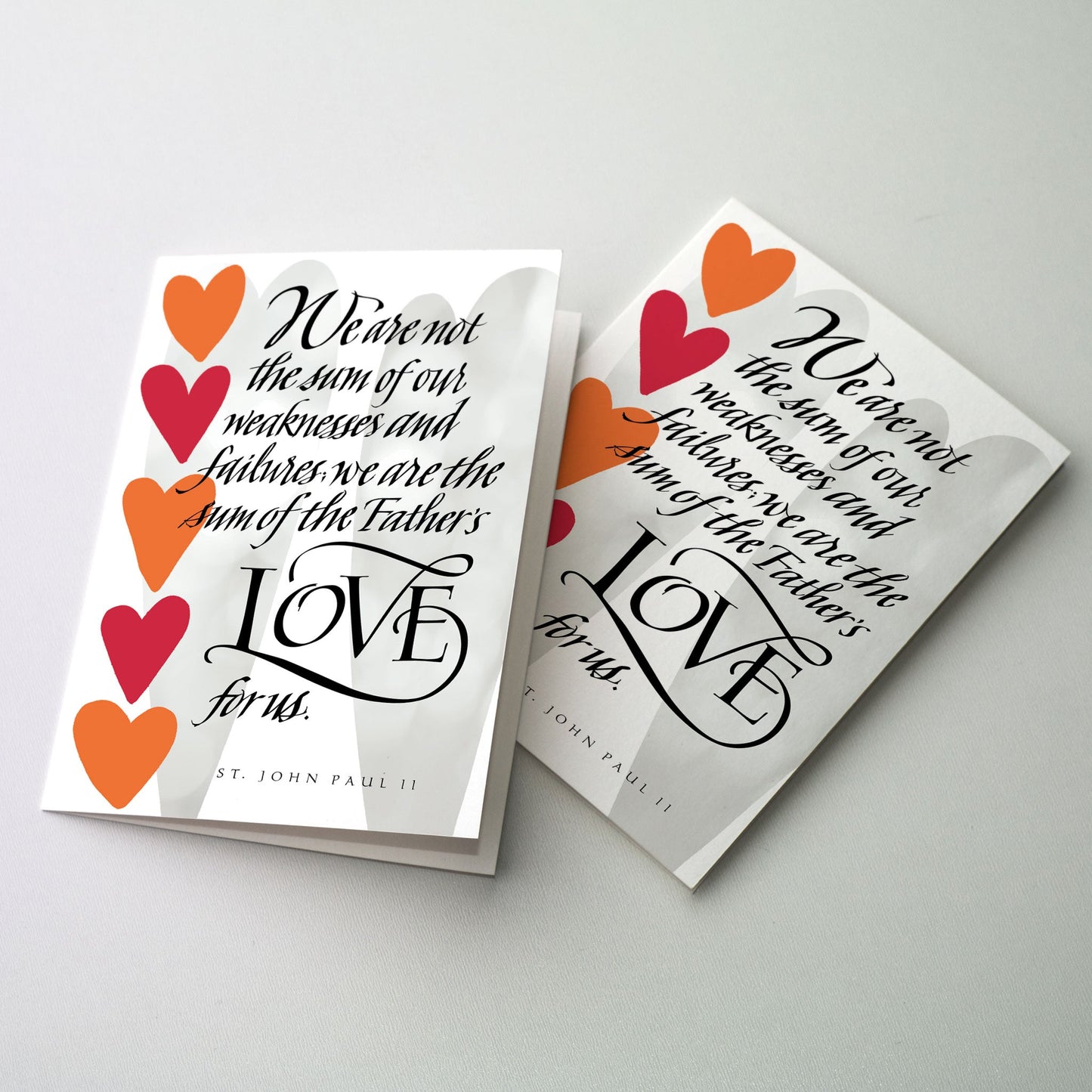 gray, orange, and red hearts with black calligraphy