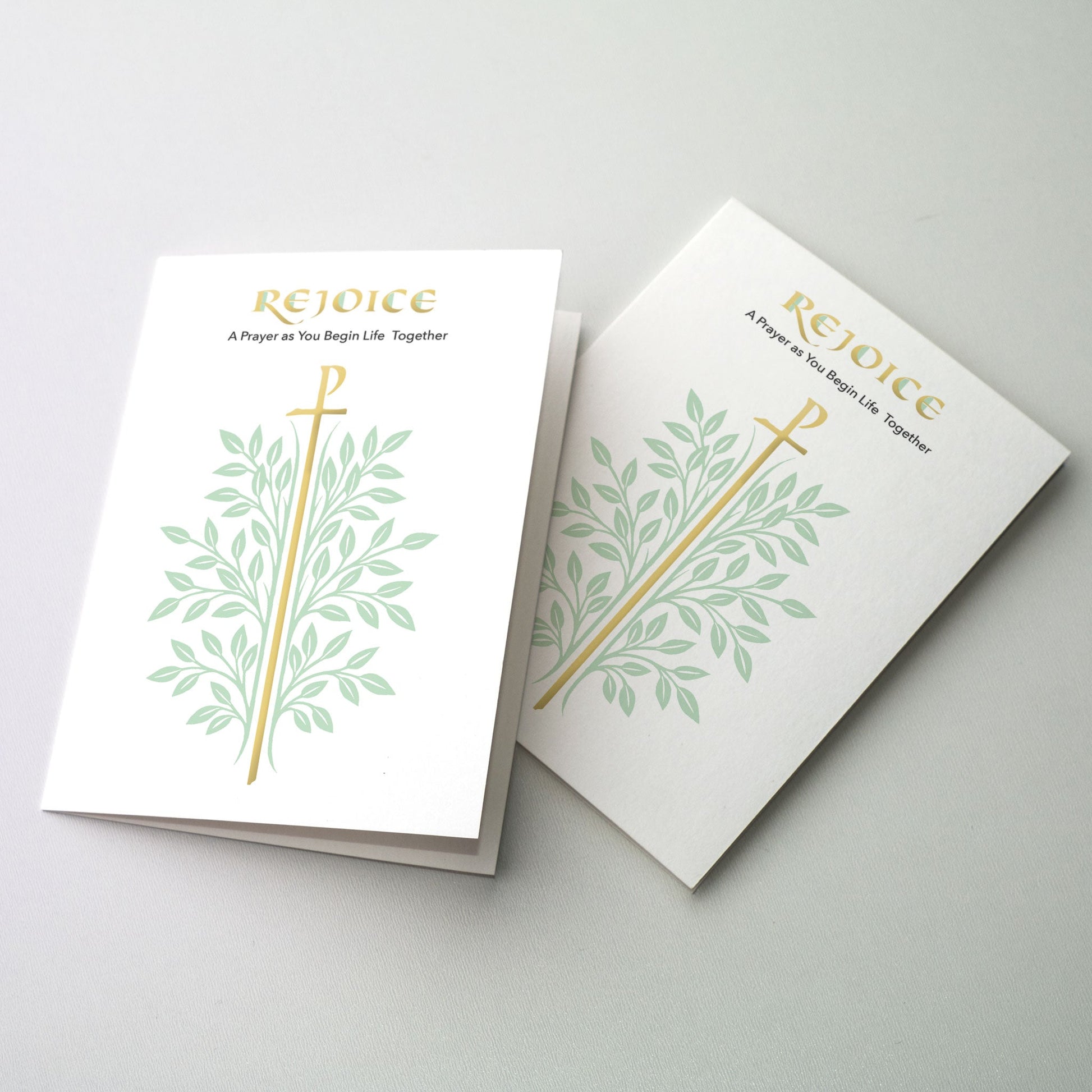 Soft green leaves with gold foil callipgrahy and Chi Rho