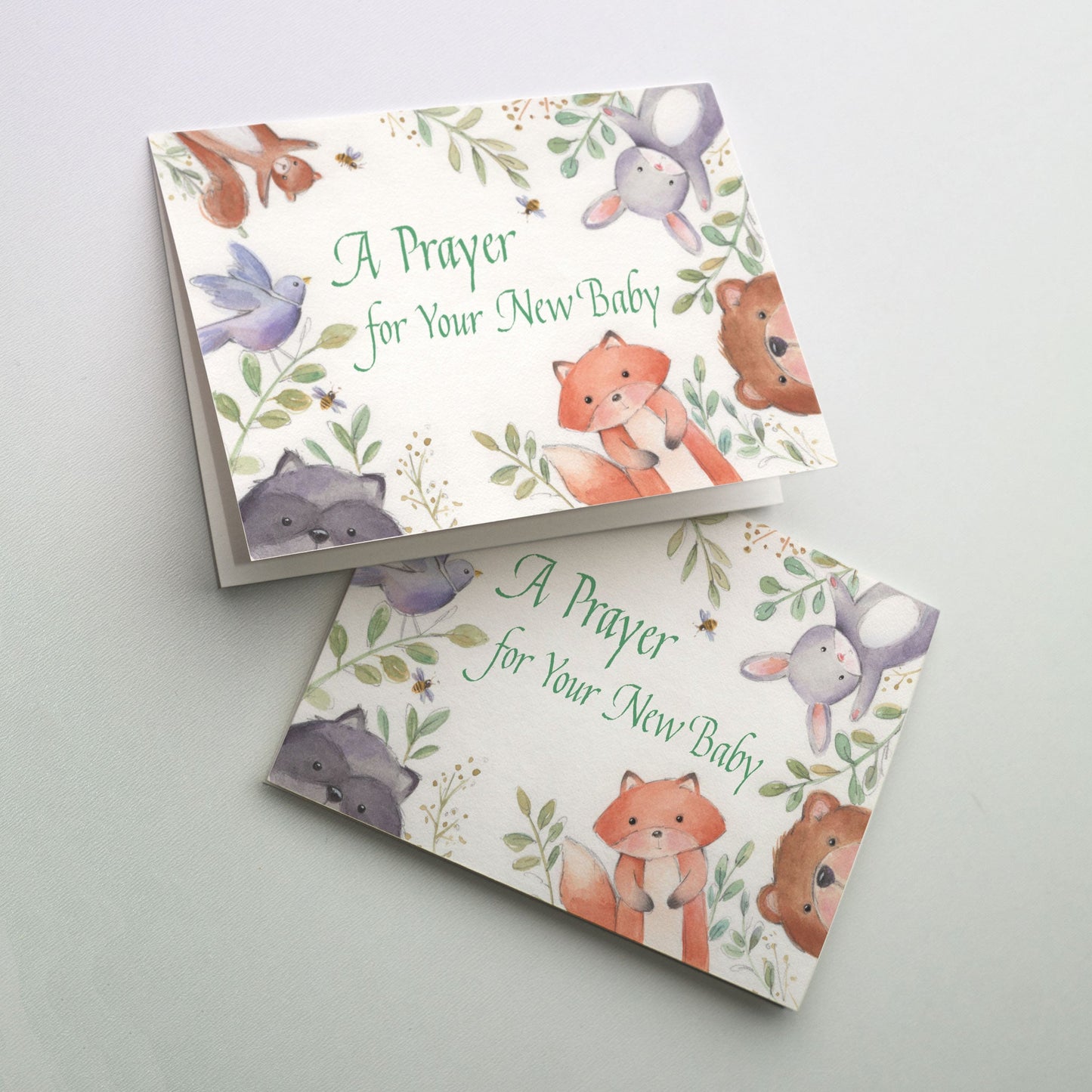 Sweet baby animals surrounding borders of card framing hand calligraphy text