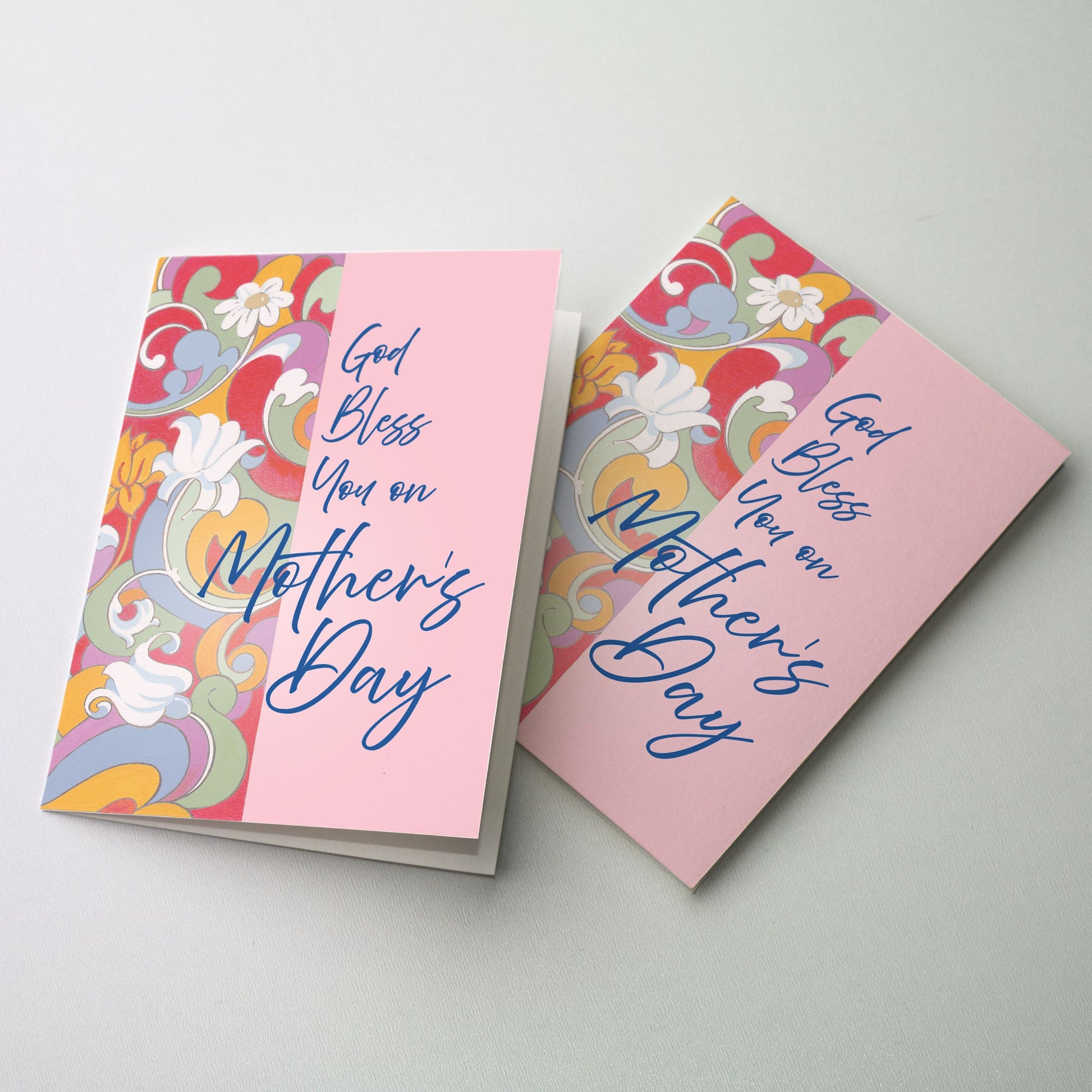 Wide banner of flower prints upon soft pink ground with title script in blue filling the right side of cover
