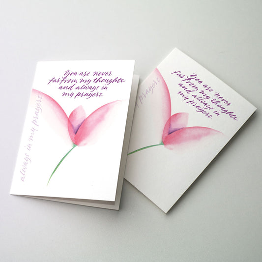 Express your thoughts of concern and prayer in calligraphy accented by a dark pink flower. The cards measure 5&quot; x 7&quot;. Printed on recycled paper.