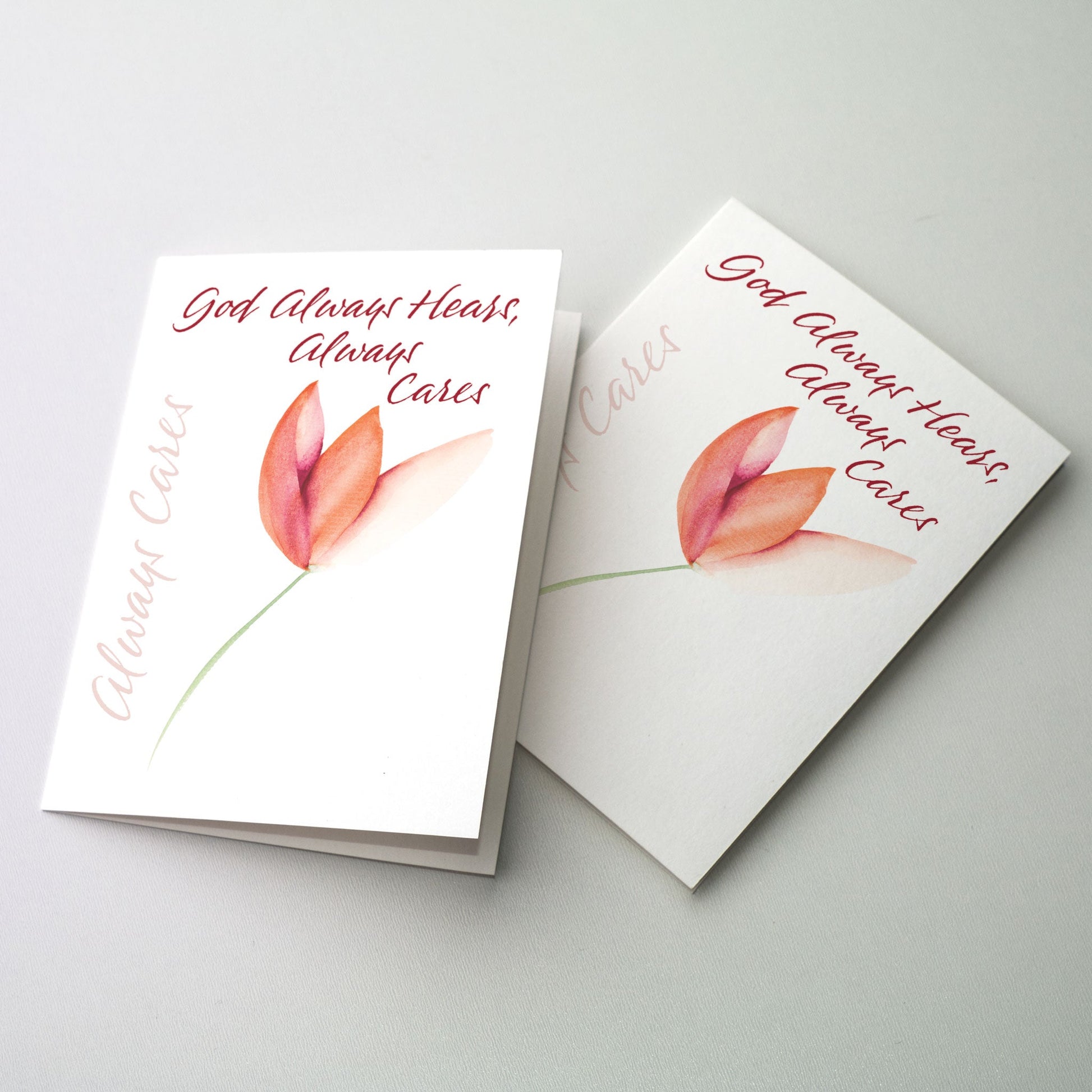 Express your thoughts of concern and prayer in calligraphy accented by a coral colored flower. The cards measure 5&quot; x 7&quot;. Printed on recycled paper.