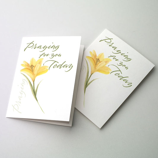 Express your thoughts of concern and prayer in calligraphy accented by a yellow day lily The cards measure 5&quot; x 7&quot;. Printed on recycled paper.