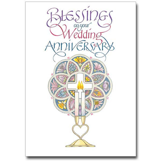 Two candles united in a cross, against a stained glass window. Rejoice with those celebrating wedding anniversaries. 5&quot; by 7&quot;.